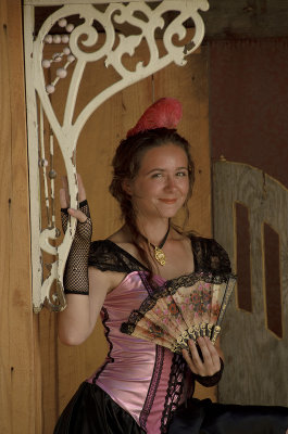Young Saloon Girl With Fan