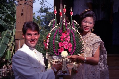 Dao and I carrying a spectacular Thai flower arrangement
