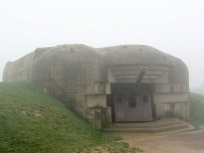 ...where a battery of several guns rises out of the mist