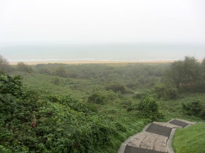 the view out to Omaha Beach from the cemetery is foggy and quiet today