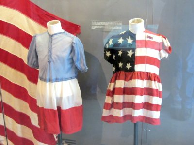 these dresses were made for young French girls from US parachute cloth, and worn for celebrations one year after D-Day