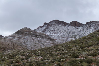 Snow-covered mountains visible from Apache Leap Road