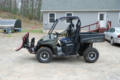 Boss straight blade plow at full lift