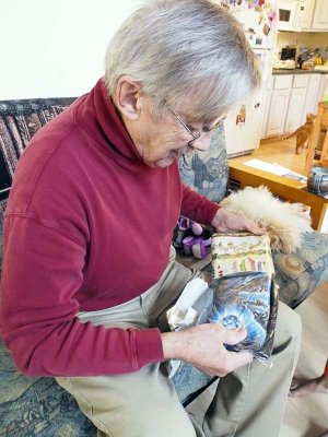 Papa opens his gift.