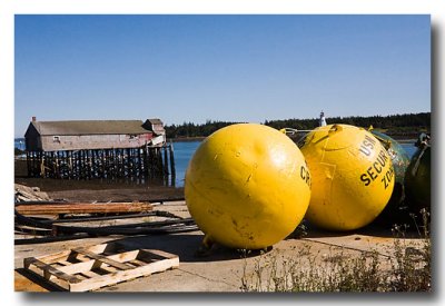 Lubec Waterfront w/ Canadian lighthouse on opposite shore.