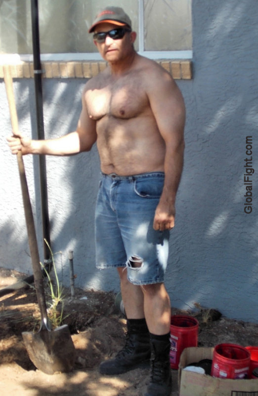hot older guy working outside backyard.jpg