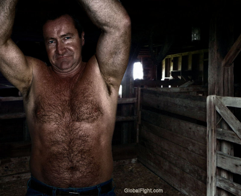 a super hot hairy farmer working barn no shirt.jpg