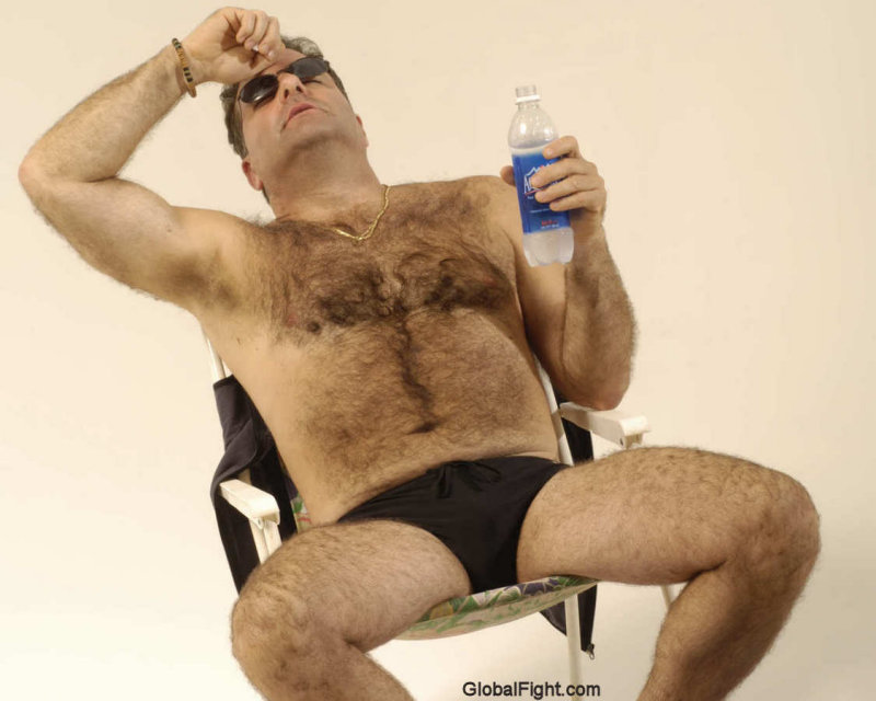 hot man cooling off beach lounge chair.jpg
