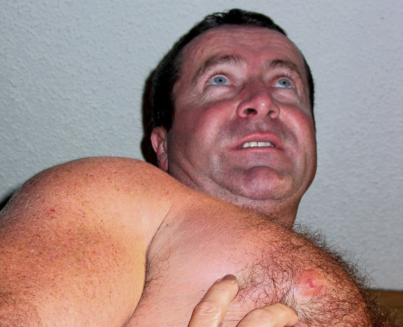 man getting nipples scratched pinched.jpg