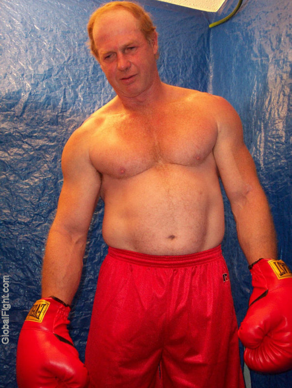 huge muscular arms boxer older men.jpg