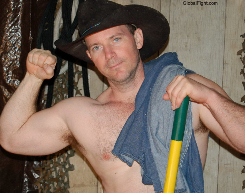 oklahoma cowboy working barn shirtless.jpg