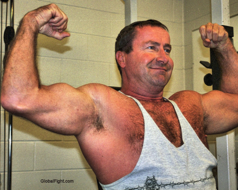massive arms hairy daddybear flexed biceps.jpg