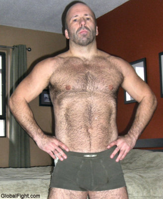 stud jock shirtless arms on hips.jpg