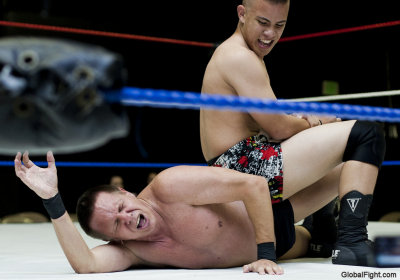 man screaming in agony wrestling.jpg