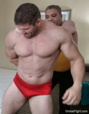muscle guys rough housing playfull wrestling.jpg