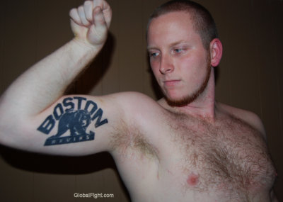 boston redhead dude flexing bicep tattoo.jpg