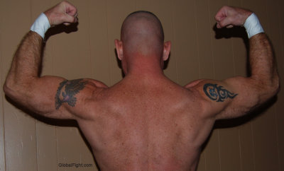 dads flexing his big hairy back muscles.jpg
