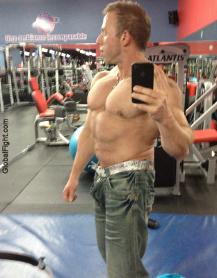 muscular strongman bodybuilder gym photos.jpg