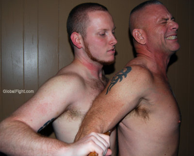 dad getting hurt painfull wrestling hold.jpg