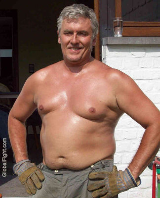 huge sweaty man pecs boobs tanned grandad.jpg