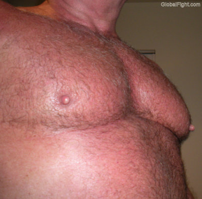 big massive gay pec hard nips.jpg by GlobalFight.com.