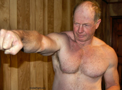 older fist punching balding stocky bear.jpg