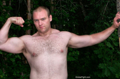 000daddie flexing big arms woods park.jpg