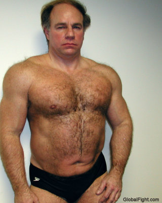 graying temples hairychest musclebear.jpg