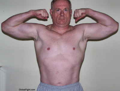 irish muscle dad flexing arms.jpg