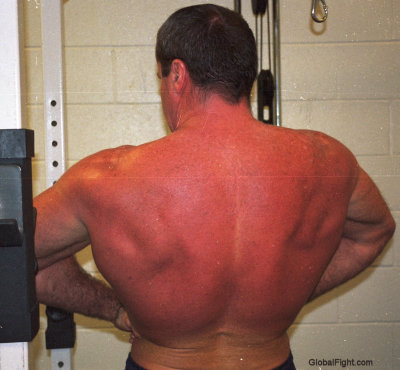 carolina jim flexing his big back muscles.jpg