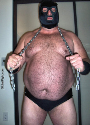 burly bondage daddie wearing chains around neck.jpg