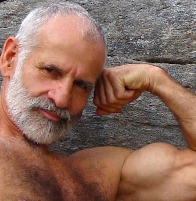 daddie flexing big biceps hairy arms.JPG