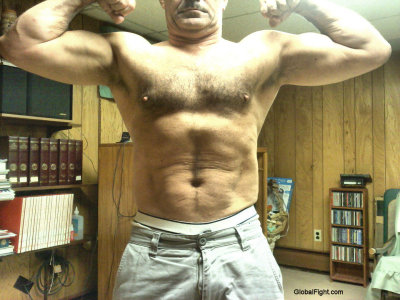 muscular older hunky beefy gay dad.jpg