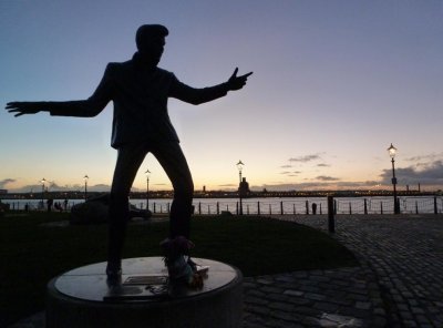 Billy Fury seems a bit taken aback by the Chrysanths someone left for him!