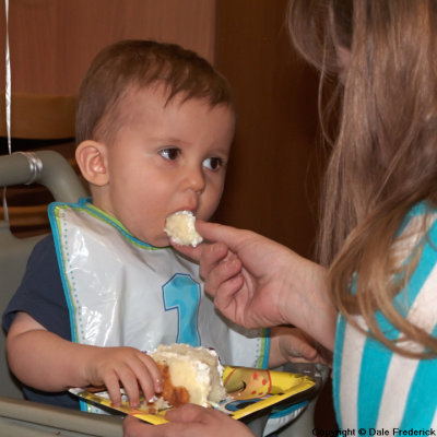 Ceremonial first bite of 1st Birthday cake