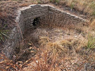 The culvert with marker in middle of upper center