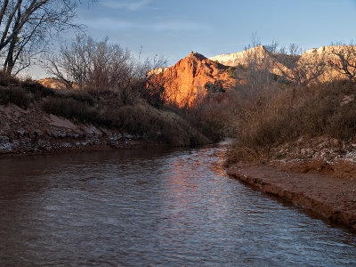 Red mountain at sunrise, from water crossing #5, on Park Road 5