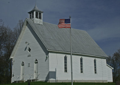McMillion Chapel with Flag Flying on Blue Sky tb0413enr.jpg