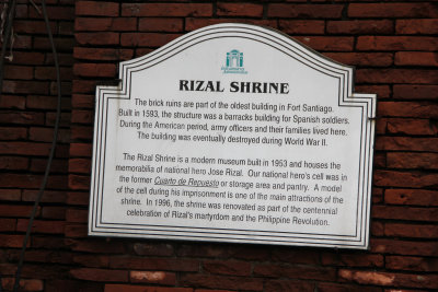 Sign describing the ruins and that the Rizal Shrine is a museum built in 1953.