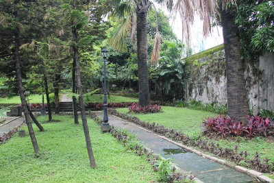 Pathway, wall and gardens at the Rizal Shrine.