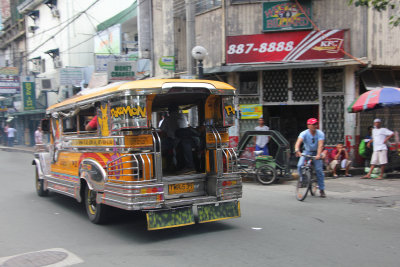 The rear of the jeepney where the passengers pile in.