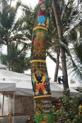 Totem pole advertising the Boracay Mandarin Island Hotel.