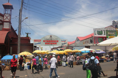 The hustle and bustle of outdoor shoppers at the Stabroek Market.