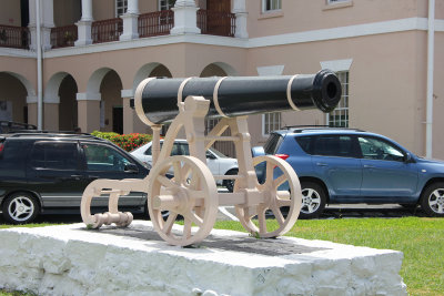 A cannon on display in front of it.