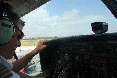 The pilot at the controls.