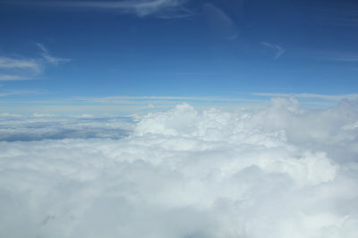 Soon, we were flying over the clouds.