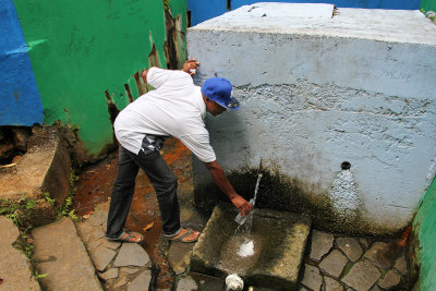 My Guide collecting water at at the spring.  It bubbles like soda water.