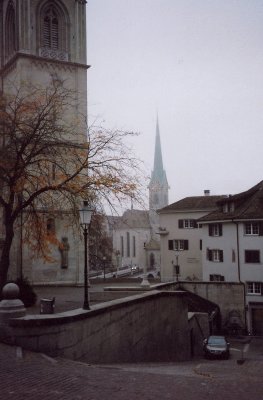 A hazy view of the tower of the Fraumunster Church.