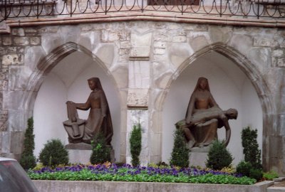 Madonna and child sculpture is on the left, and piet sculpture is on the right.