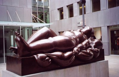 Ruhende Frau (1993) is a sculpture of a (portly) reclining woman outside the Kunstmuseum by Colombian artist Fernando Botero.